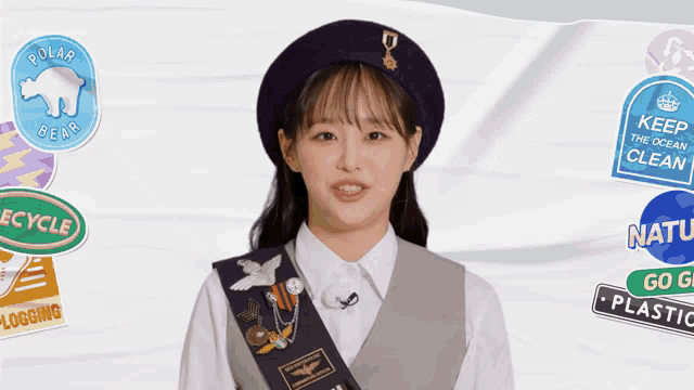 a girl scout wearing a purple hat and a badge that says polar bear