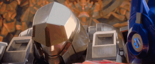 a close up of a robot 's head with the word transformers on it