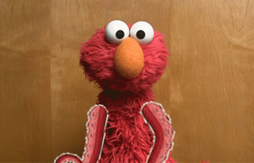 Elmo Shrug GIF - Elmo Shrug Tentacles GIFs