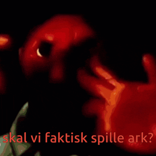 a picture of a red monster with the words skal vi faktisk spille ark