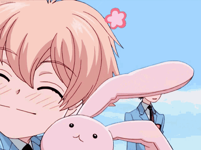 a cartoon of a girl holding a pink stuffed rabbit