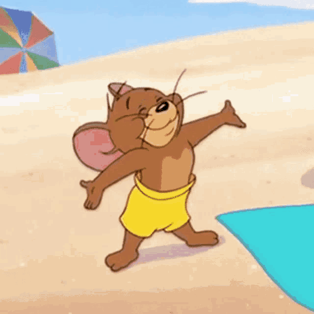 a cartoon mouse wearing yellow shorts is standing on a beach .