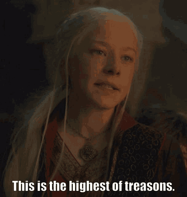a woman with long white hair and the words this is the highest of treasons