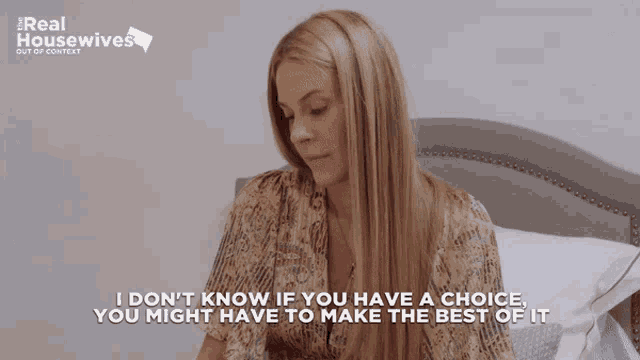 a woman sitting on a bed with the words i don t know if you have a choice you
