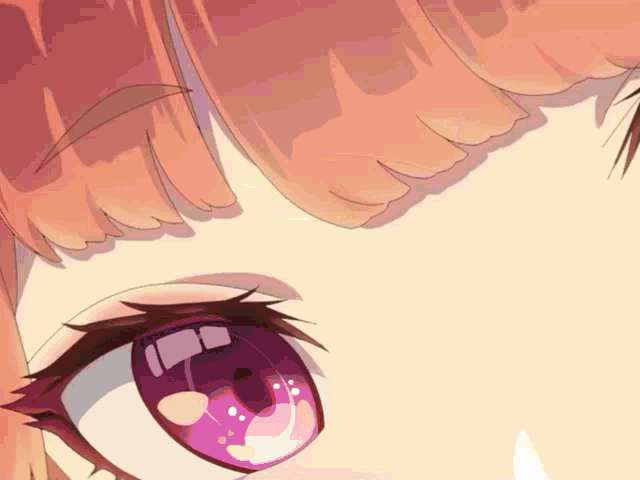 a close up of a girl 's eye with a tear coming out of her eye