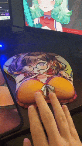 a person 's hand rests on a mouse pad with a girl on it