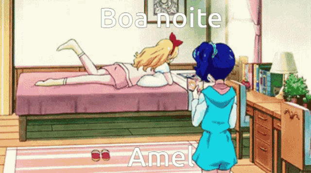 a girl in a blue dress is standing next to a girl laying on a bed with the words boa noite written above her