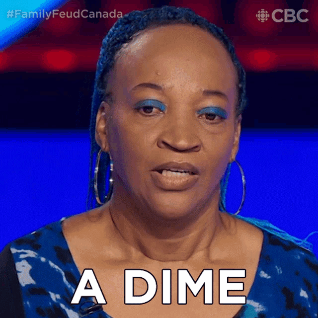 a woman in a blue dress says a dime on her face