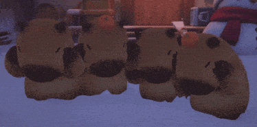 a row of stuffed animals with an orange on their heads