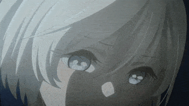 a close up of a person 's face with white hair