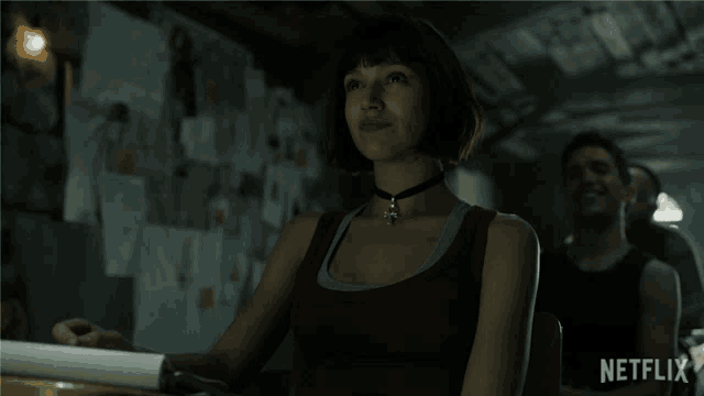 a woman in a red tank top is smiling in a netflix ad