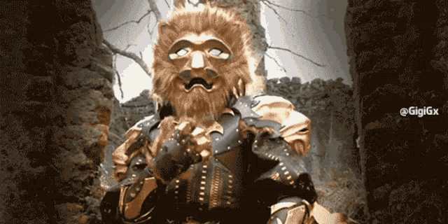 a picture of a lion with a mask and the hashtag gigigx on the bottom right