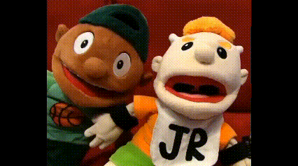two stuffed animals are standing next to each other with one wearing a shirt that says jr
