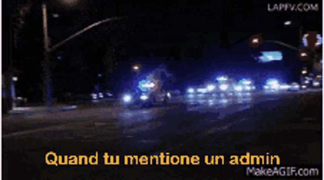 a blurry picture of a street at night with the words quand tu mentione un admin on the bottom