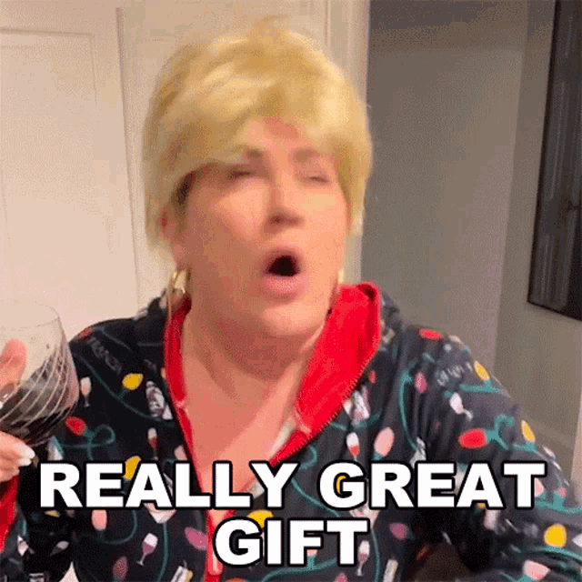 a woman in a wig is holding a glass of wine and saying really great gift