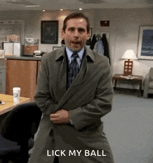 a man in a suit and tie is dancing in an office .