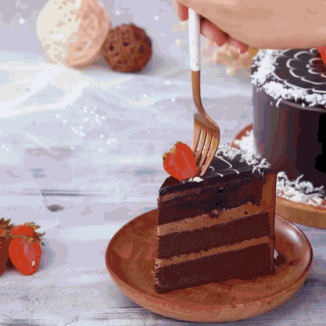 a slice of chocolate cake with strawberries on top