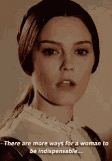 a close up of a woman 's face with the words `` there are more ways for a woman to be indispensable ... ''