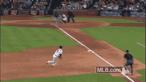 a baseball game is being played and the mlb.com logo can be seen