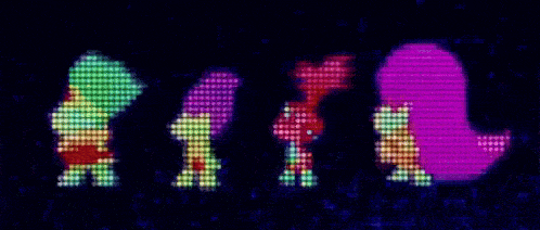a group of trolls are standing next to each other in a row on a screen .