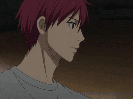 a close up of a person with red hair