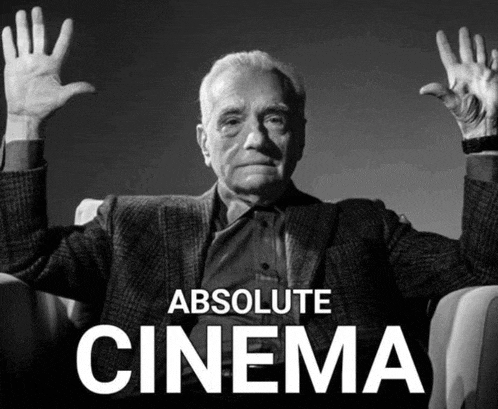a black and white photo of a man with his hands in the air with the words absolute cinema below him