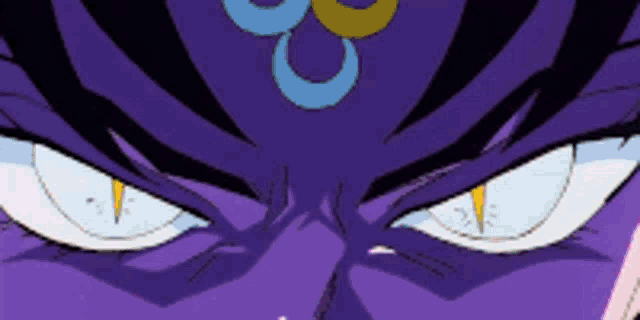 a close up of a cartoon character 's eyes with a blue and yellow symbol on his forehead