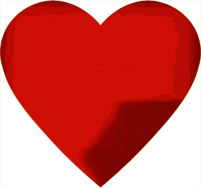 a red heart that says i love scrabble tiles