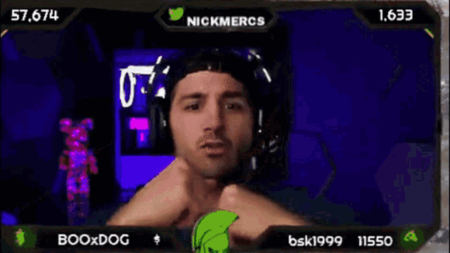 a man wearing headphones is giving a fist bump in a video game