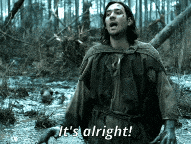 a man in a swamp with the words it 's alright