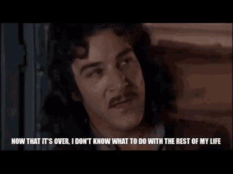 a man with long hair and a mustache says now that it 's over i don 't know what to do with the rest