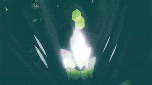 a blurry picture of a blue and green object