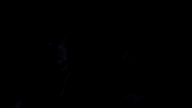 a man and a woman are kissing with hearts flying in the background