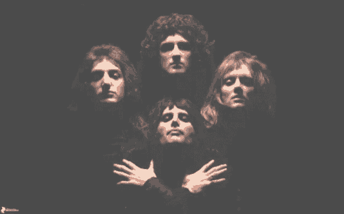 a group of men with their hands on their chests in front of a black background