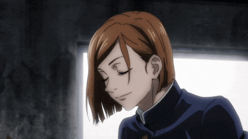 a girl with brown hair and a black jacket looks down with her eyes closed