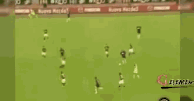 a blurry picture of a soccer field with the word element on the bottom left
