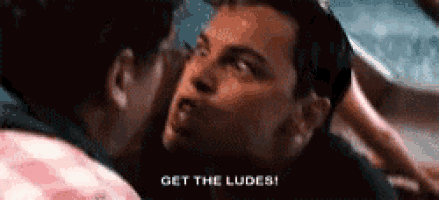 two men are kissing and one of them is saying " get the ludes "