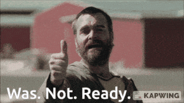 a man with a beard giving a thumbs up with the words was not ready behind him