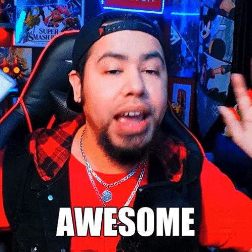 a man with a beard is wearing a hat and a red shirt and says awesome