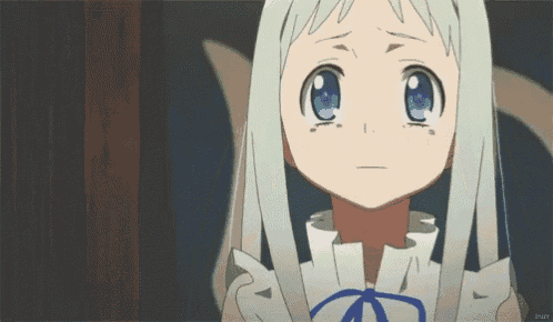 a close up of a girl 's face with a blue eye
