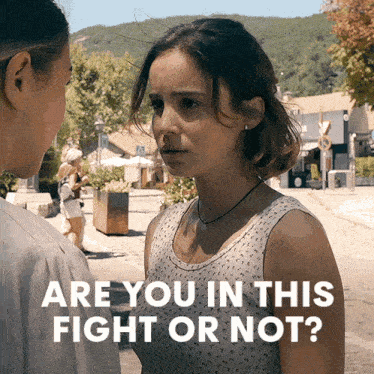 a woman talking to another woman with the words " are you in this fight or not " below her