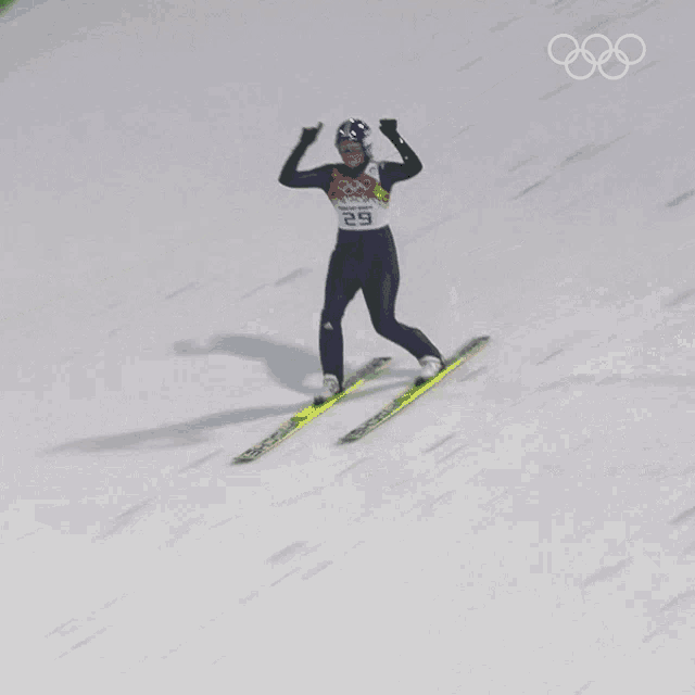 a person on skis with the number 29 on the front