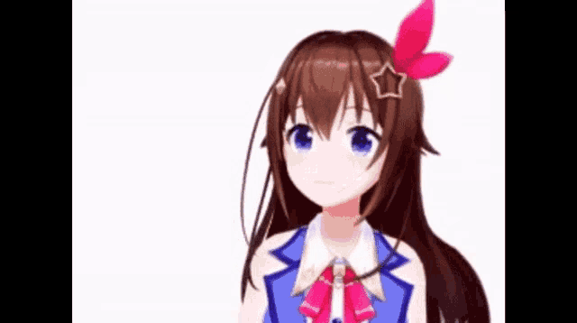 a girl with long brown hair and blue eyes is wearing a blue shirt and a pink bow .