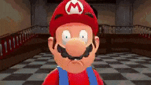 a close up of a cartoon character wearing a red hat with a white m on it .