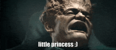 a statue of a man with the words little princess written below it