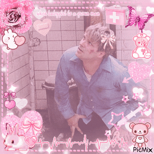 a man in a blue shirt is surrounded by pink hearts and a pink box with a white cross on it