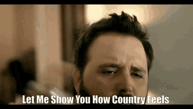 a man with the words let me show you how country feels on his face