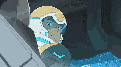 a cartoon character wearing a helmet is sitting in a vehicle .