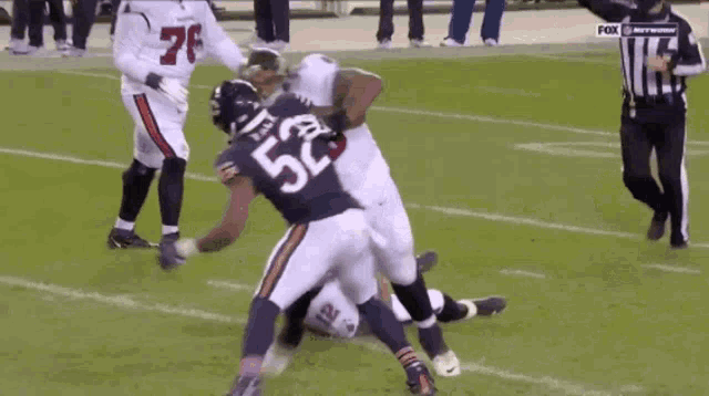 a football player with the number 52 on his back