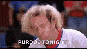 a man in a hockey uniform is saying `` purdue tonight '' in a movie .